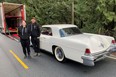 Christina Kelbert and Michael Bar about to load a 1956 Continental into their 80-foot-long car hauler for the trip from Vancouver to Toronto.