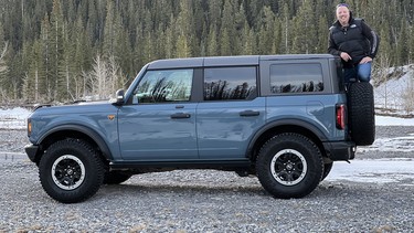 Six-foot-three Chris Braun with the Ford Bronco Badlands he drove in and around Calgary for a week.