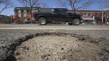 A pothole along Bloor St. W., near Royal York Rd. in Toronto, Ont. on Saturday May 1, 2021.