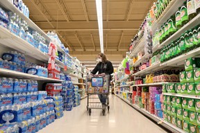Jen Valencia shops for a customer as she supplements her income working for Instacart at Acme Market on April 27, 2020 in Clark, New Jersey.