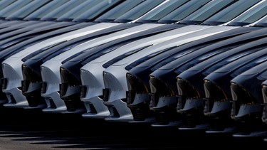 Tesla cars are seen parked at the construction site of the new Tesla Gigafactory for electric cars in Gruenheide, Germany, March 20, 2022.