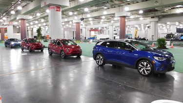 A row of electric vehicles await test drivers at the EV Test Track in the basement of the Javits Convention Centre.