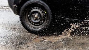 Large pothole in Montreal, Quebec.