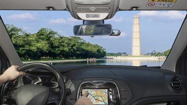 Driving a car while using the touch screen of a GPS navigation system