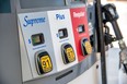 Supreme, Plus, Regular gasoline at a gas station pump