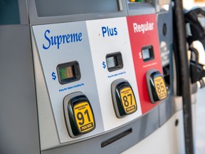 Supreme, Plus, Regular gasoline at a gas station pump