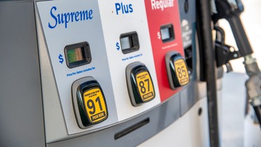 Supreme, Plus, Regular gasoline at a gas station pump