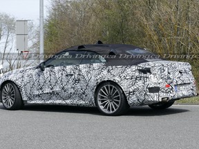 Spy photos of what may be the 2023 Mercedes-Benz C-Class convertible in AMG spec
