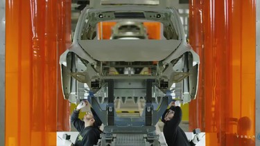 A Tesla being manufactured in the company's new Giga Texas plant