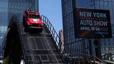 A 2022 Jeep Wrangler Rubicon 4xe negotiates the Camp Jeep track during the first press day of the 2022 New York International Auto Show, in Manhattan.