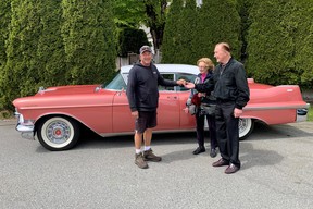 Ian Tanner hands over the keys after finding and restoring his parents Ray and Virginia Tanner’s prized pink Cadillac.