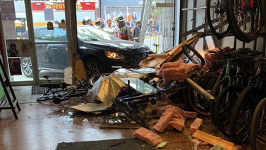 A Volvo SUV struck the storefront of Toronto bike shop Sweet Pete's, May 26, 2022