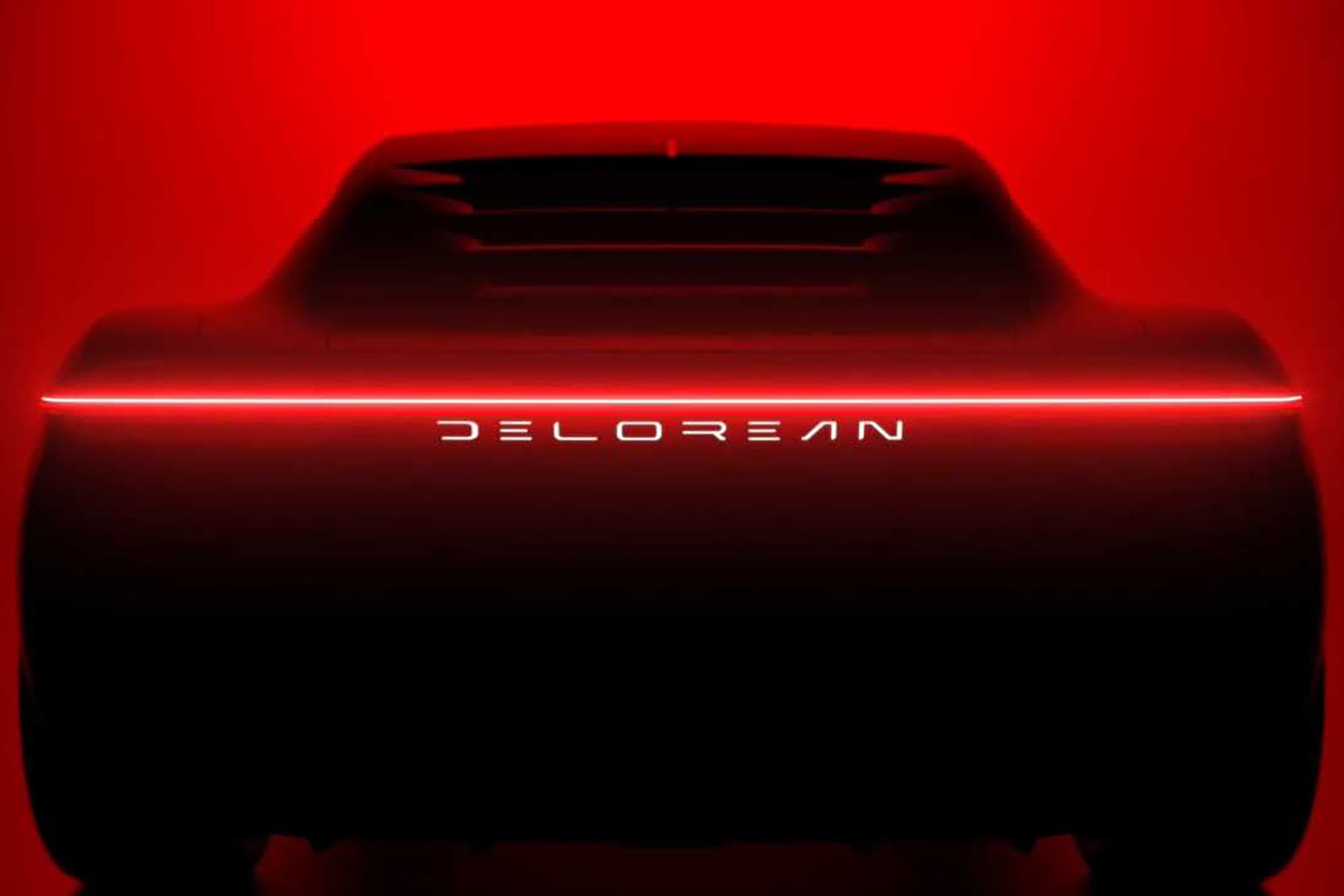 DeLorean teases full-width taillight, louvered rear window