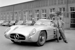 The photo shows one of two 300 SLR Uhlenhaut Coupés with inventor Rudolph Uhlenhaut.