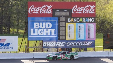 The new OES scoreboard is "another great step to that next level" for Delaware Speedway, says driver DJ Kennington, seen here zooming past the new board in his No. 17 Castrol-sponsored car. (Derek Ruttan/The London Free Press)