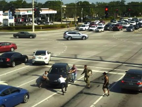 WATCH- Brave strangers stop moving car carrying incapacitated woman