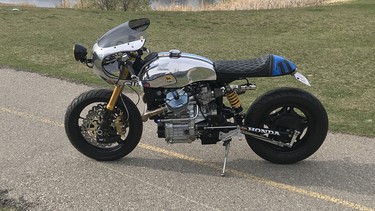 Built for his friend Jason Nycz, Stu Lloyd started with a 1982 Honda CX500C and completely modified it with a Lyta-style aluminum gas tank, Omega Racer fairing and Suzuki GSXR100R forks.