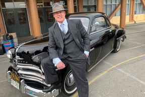 Dennis Hoy with the 1950 Plymouth coupe that was the car next door when he was a child.