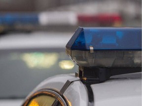 A photo of the sirens of a row of police cruisers