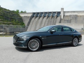 The 2023 Electrified G80 with Beaver Dam in the Ozarks Highlands region of northwest Arkansas in the background.