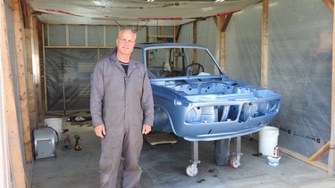 Thane Walton in his 30-foot by 30-foot workshop with his spray booth and the 1972 BMW 2002tii. Having made tremendous progress since the fall of 2021, he says he’s pressing pause on the restoration for the summer and will begin bolting it back together this fall.