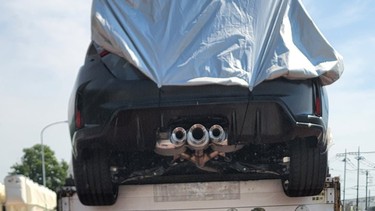 An image taken by a Twitter user in Japan shows a couple of wrecked Civics on the back of a truck after a crash test.