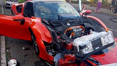 A Ferrari SF90 supercar after crashing into five cars on May 25, 2022, in Birmingham, England