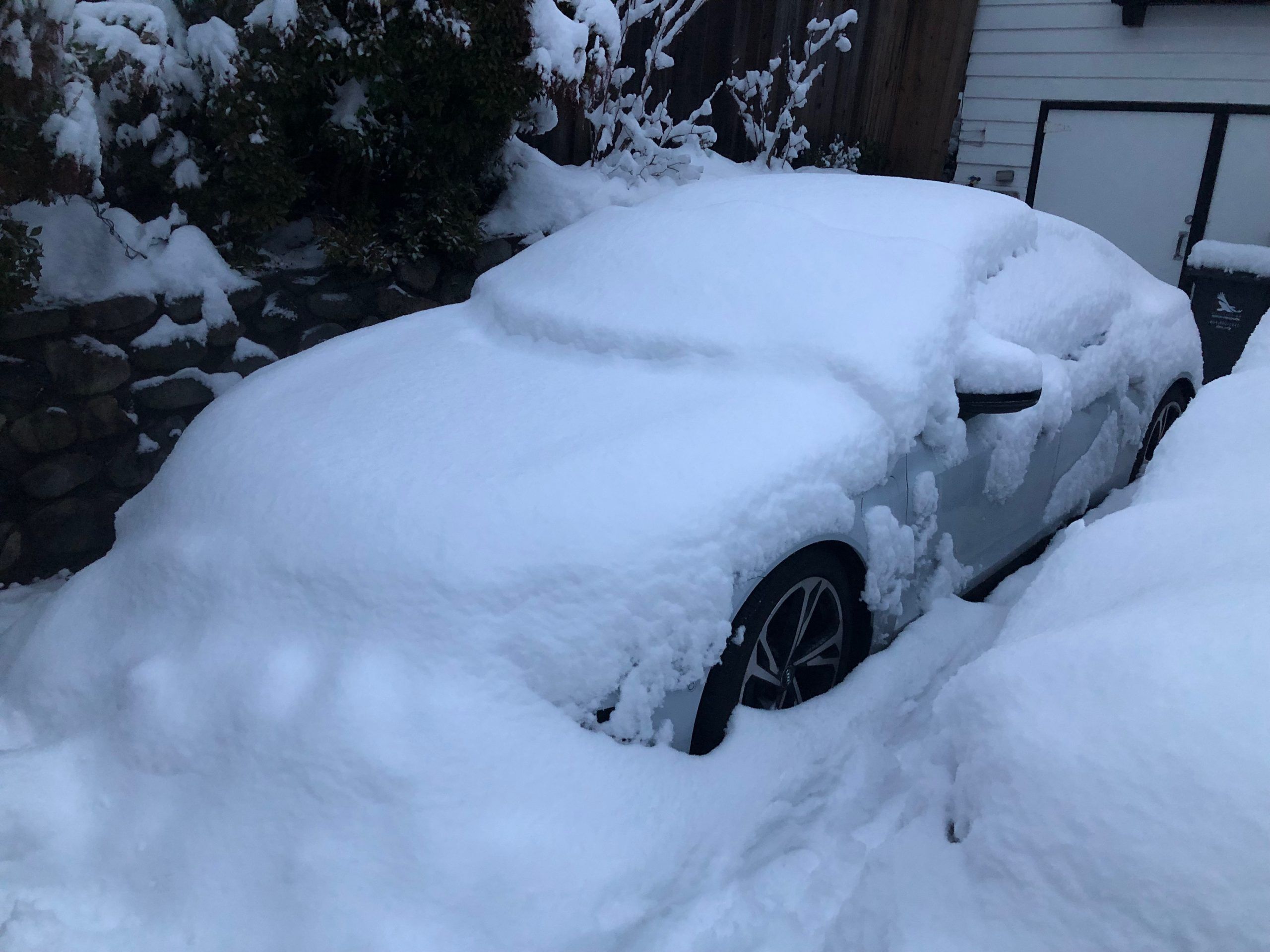 The e-tron GT in winter hibernation, a four-week session that left the lithium-ion battery fully charged up but resulted in a dead 12-volt battery. CREDIT: Andrew McCredie