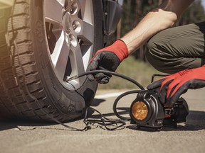 Roadside tire inflation with a portable pump. These pumps are slow, but can save the day in the driveway or on the go.
