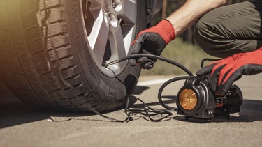 Roadside tire inflation with a portable pump. These pumps are slow, but can save the day in the driveway or on the go.