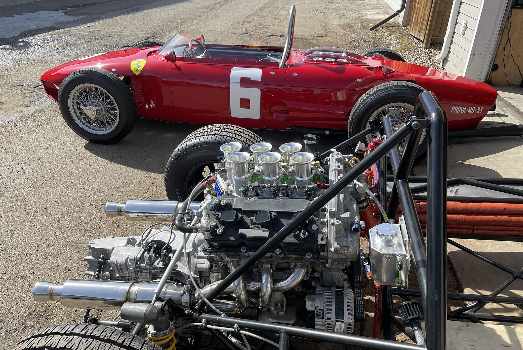 In his humble two-car Airdire garage, Brandon Hegedus built the remarkable 1962 Ferrari 156 ’Sharknose’ F1 tribute car. He’s now at work on a 1966 Ferrari Dino 206S/SP tribute car that’s powered by a highly-modified Nissan 350Z V6 engine. CREDIT: Brandon Hegedus