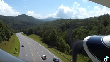 An engine issue forced a pilot to land on a North Carolina highway