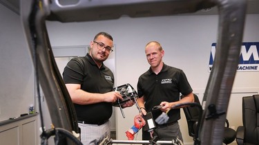 Ahmad Farghawi, left, vice-president of engineering and Mark Little, advanced engineering manager at Windsor Machine Group are shown at the company on Monday, July 25, 2022. The company has developed new head rest technology to mitigate whiplash with rear-end collisions.