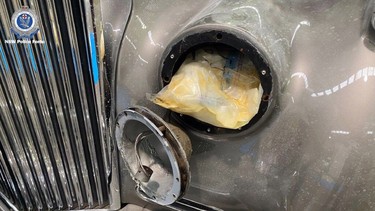 Police in Australia discovered cocaine and meth hidden behind a headlight of a vintage Bentley luxury sedan shipped from Canada. Two men were arrested.