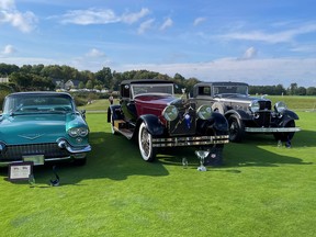 The Best of Show 1928 Isotta-Fraschini (center), with Vernon Smith's Most Outstanding Post-War classic 1957 Cadillac Eldorado Brougham (left), and the Most Outstanding Pre-War classic 1932 Lincoln KB coupe owned by Bill and Rita Wybenga