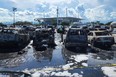 Several cars burned in the aftermath of a September 2022 NFL tailgate party in Miami