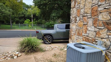 A Rivian R1T plugged into the tools in a doctor's office in Texas