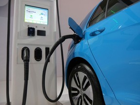 An electric vehicle charging station at the Volkswagen display at the Canadian International Auto Show in Toronto