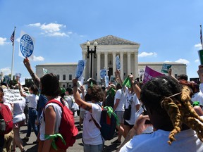Abortion rights activists rally outside the U.S. Supreme Court after the overturning of Roe Vs. Wade, in Washington, DC, on June 30, 2022.