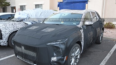 A spy shot of the 2024 Buick Envision prototype