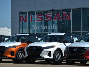 Nissan vehicles parked outside a Nissan dealership in South Edmonton, Alberta, on Wednesday, 24 August 2021.
