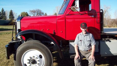 Peter Macklin of High River, Alta. has owned the 1967 Fargo Power Wagon (left) since new. He’s restored the truck, and also the 1941 Sterling HC 145 chain-drive to the right.