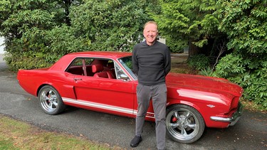 Jack Frank with the 1966 Mustang he has owned for 53 years and rebuilt three times.