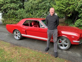 Jack Frank with the 1966 Mustang he has owned for 53 years and rebuilt three times.