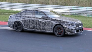 Spy shots of the seventh-gen 2024 BMW M5 testing on the Nurburgring