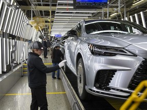 The fifth-generation Lexus RX being assembled on a Canadian assembly line