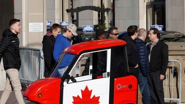 Stronach International presented its SARIT vehicle in Ottawa Wednesday. The made-in-Canada SARIT is a one or two-seater micro-mobility vehicle that can dramatically reduce greenhouse gas emissions and traffic congestion. TONY CALDWELL, Postmedia.