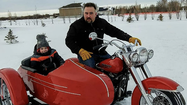 Keith Blais and his son, Waylon, aboard their 1953 Harley-Davidson Pinhead with sidecar. It took Blais 22 years of acquiring parts to complete the restoration of this machine.