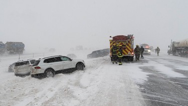 FILE PHOTO: Emergency responders work at the scene of a multi-vehicle crash on Queen Elizabeth II Highway near Ponoka on Saturday, Nov. 5, 2022.