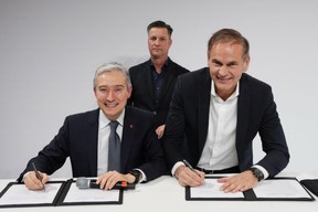 The Canadian Minister for Innovation, Science and Industry, François-Philippe Champagne, left; Thomas Schmall, Group Board Member for Technology at Volkswagen AG, center; and Oliver Blume, CEO Volkswagen AG